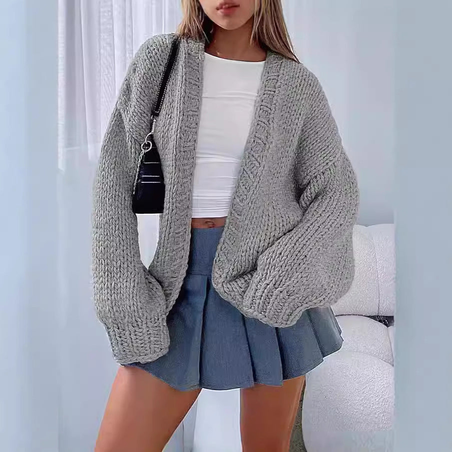 Kvinnors mjuka stickade cardigan med voluminösa ärmar och öppen front Mirla-Eva Jonsson
