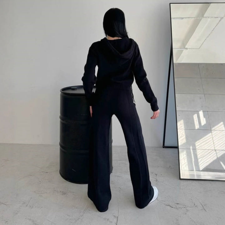 Kvinnors mjuka stickade jumpsuit med huva och hög krage Mirla-Eva Jonsson