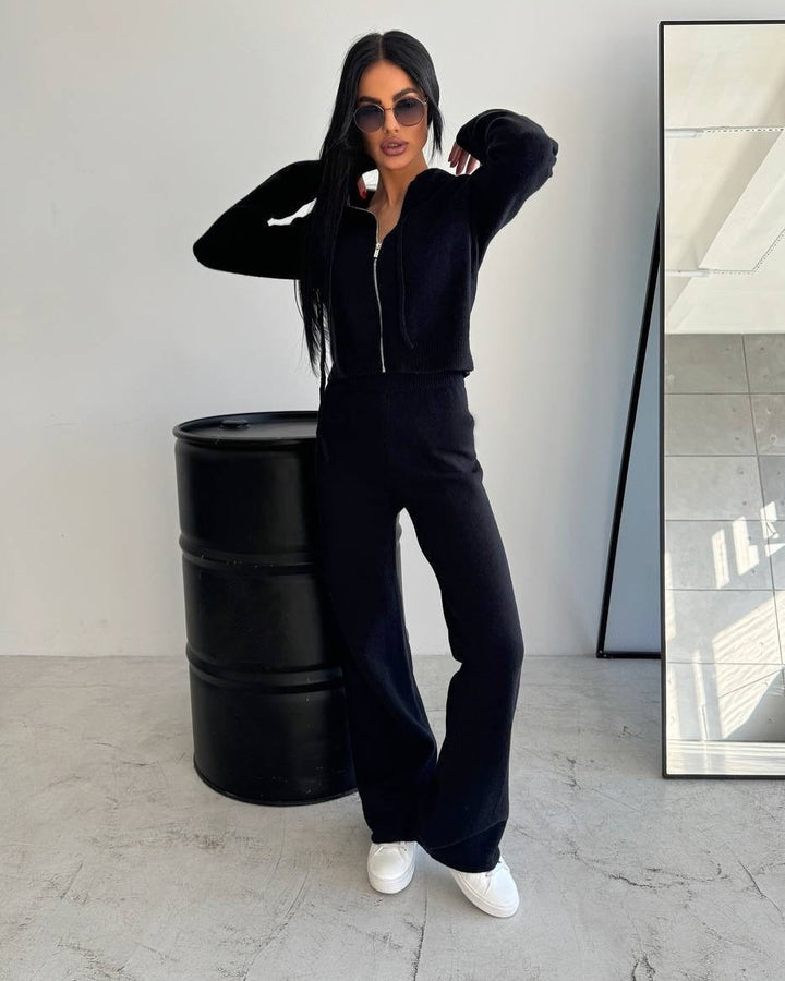 Kvinnors mjuka stickade jumpsuit med huva och hög krage Mirla-Eva Jonsson