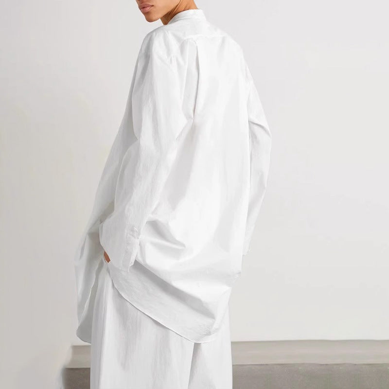 Kvinnors mode blus med rund krage och asymmetrisk skärning Mirla-Eva Jonsson