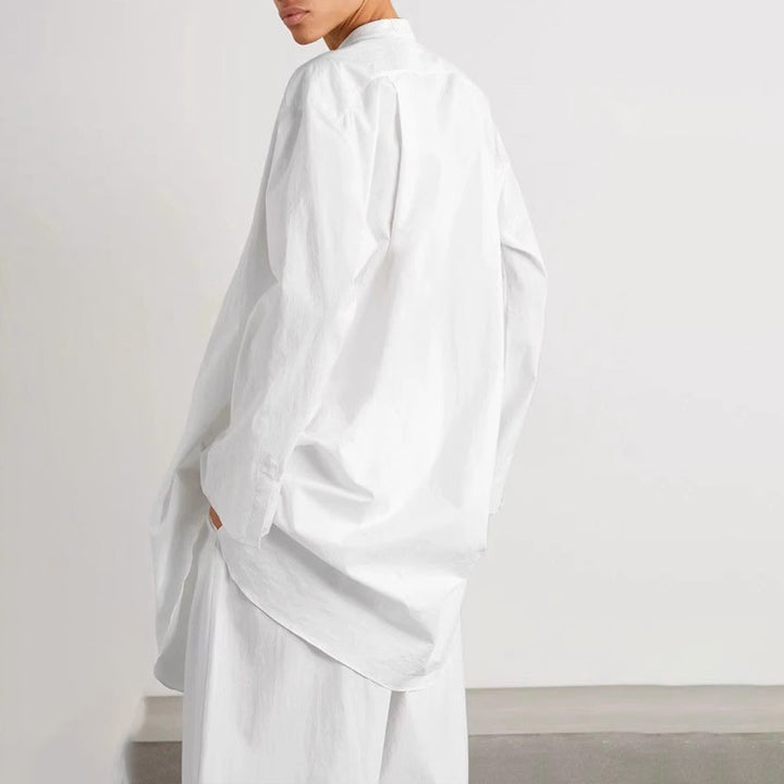 Kvinnors mode blus med rund krage och asymmetrisk skärning Mirla-Eva Jonsson