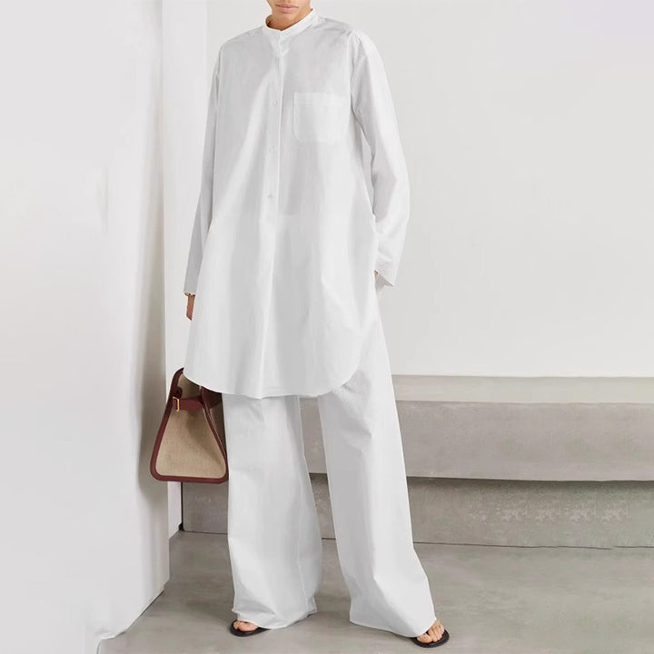Kvinnors mode blus med rund krage och asymmetrisk skärning Mirla-Eva Jonsson