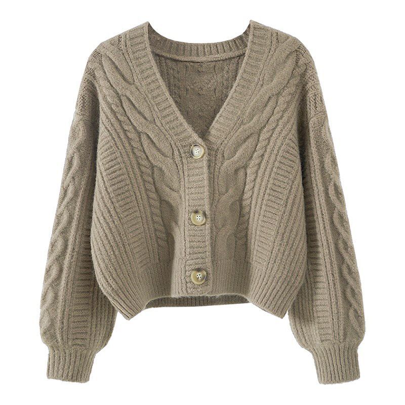 Kvinnors mode cardigan med kabelstickat mönster och extravaganta knappar Detaljer Mirla-Eva Jonsson