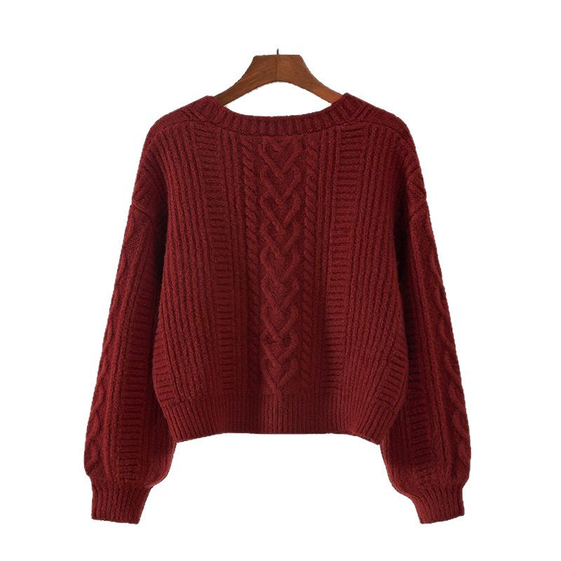 Kvinnors mode cardigan med kabelstickat mönster och extravaganta knappar Detaljer Mirla-Eva Jonsson