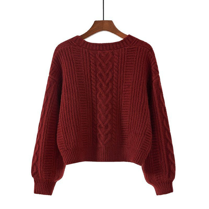 Kvinnors mode cardigan med kabelstickat mönster och extravaganta knappar Detaljer Mirla-Eva Jonsson
