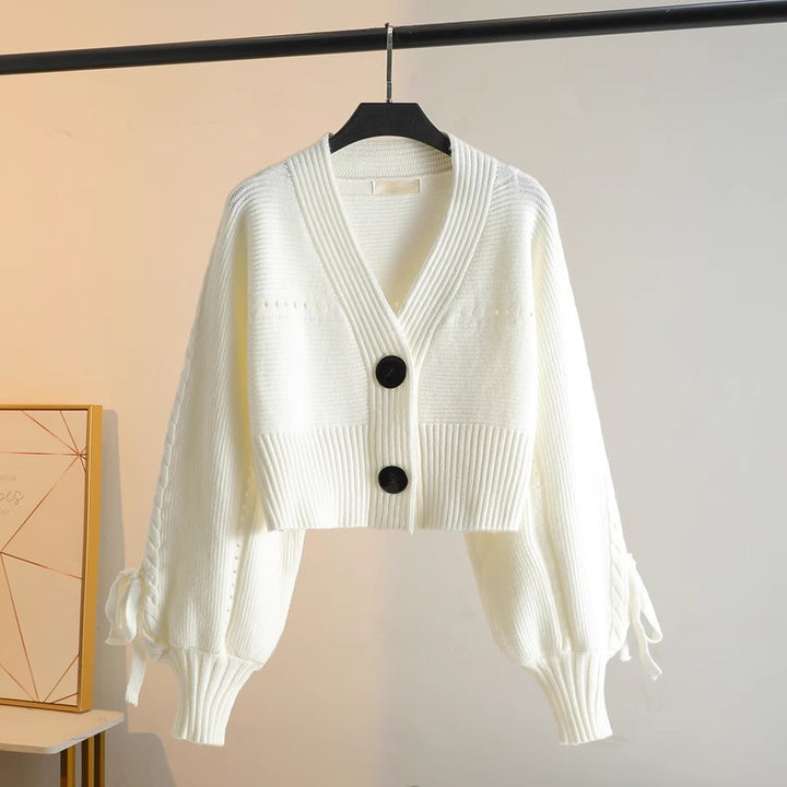 Kvinnors mode cardigan med voluminösa ärmar och knapplösningar Mirla-Eva Jonsson