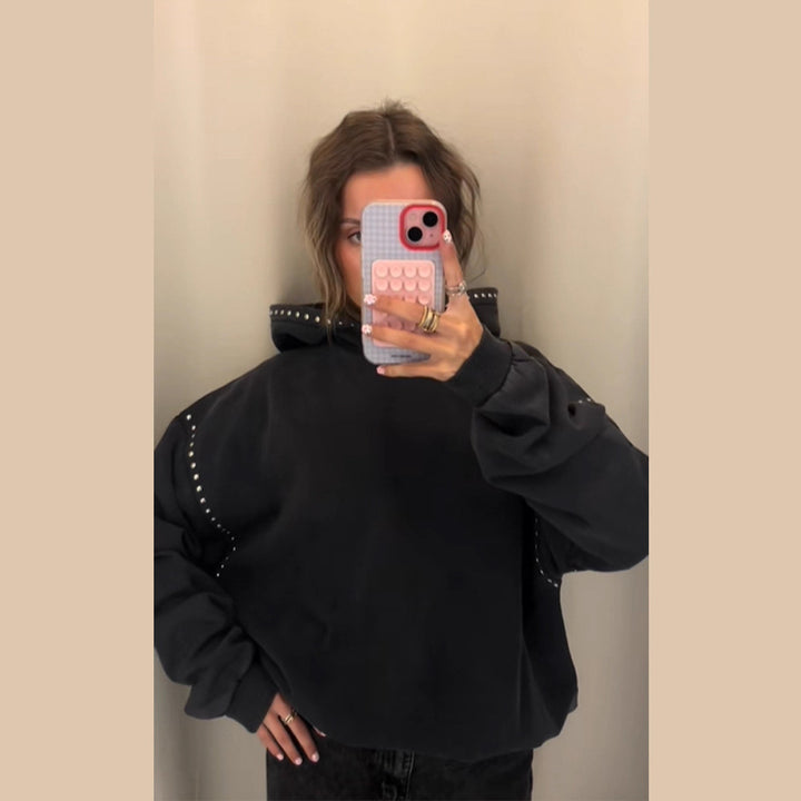Kvinnors mode hooded sweatshirt med eleganta nitar dekorationer Mirla-Eva Jonsson