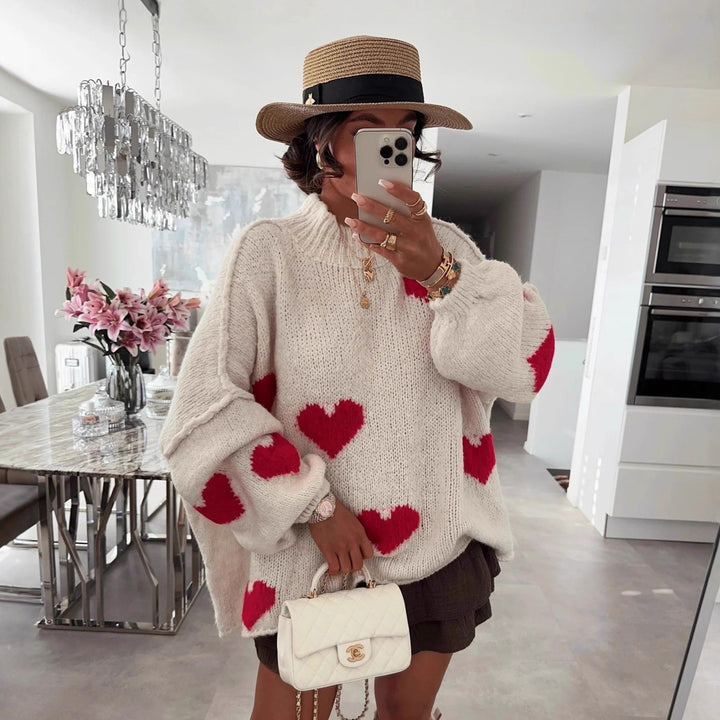Kvinnors mode oversized tröja med hjärtformat mönster och voluminösa ärmar Mirla-Eva Jonsson