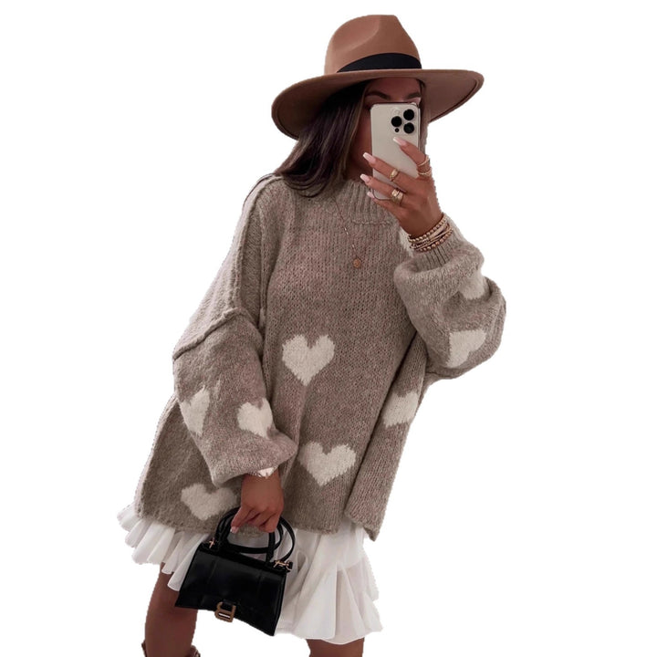 Kvinnors mode oversized tröja med hjärtformat mönster och voluminösa ärmar Mirla-Eva Jonsson
