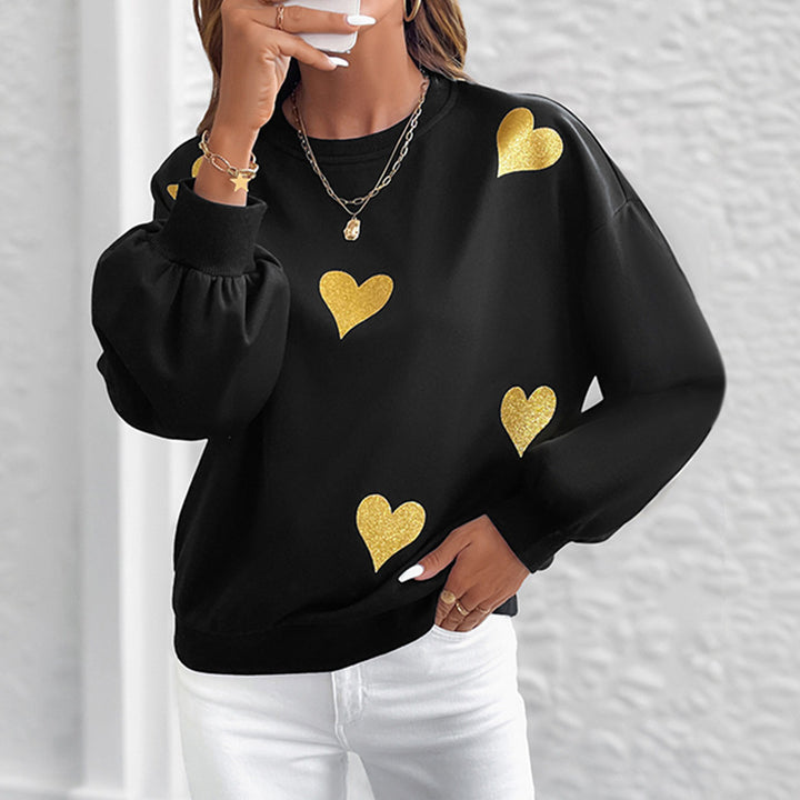 Kvinnors mode sweatshirt med guldhjärta tryck Mirla-Eva Jonsson