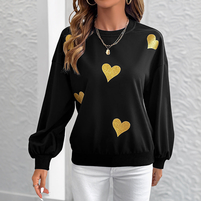 Kvinnors mode sweatshirt med guldhjärta tryck Mirla-Eva Jonsson