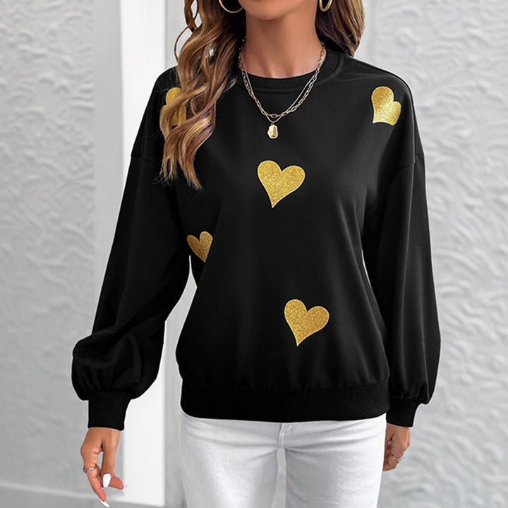 Kvinnors mode sweatshirt med guldhjärta tryck Mirla-Eva Jonsson