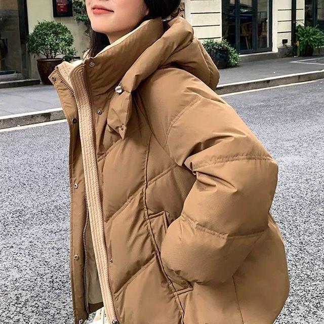 Kvinnors mode vadderad jacka med hög krage Mirla-Eva Jonsson