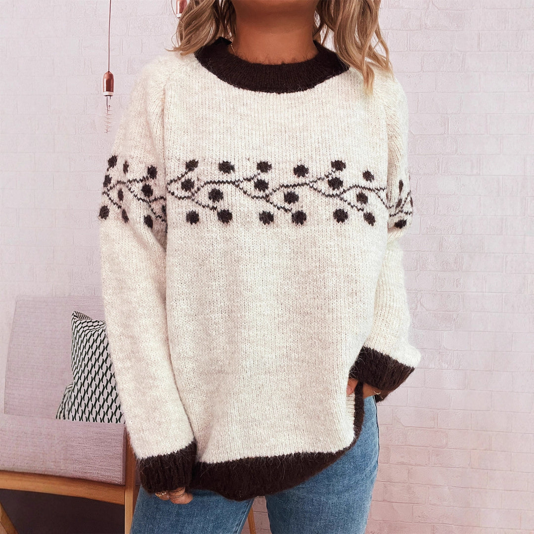 Kvinnors modemedvetna stickade tröja med handvävd blommönster Mirla-Eva Jonsson