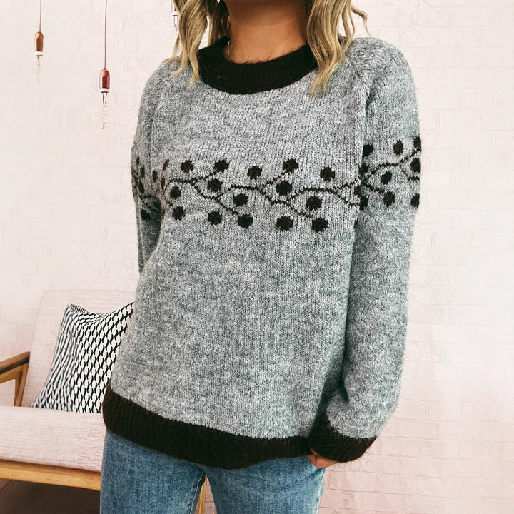 Kvinnors modemedvetna stickade tröja med handvävd blommönster Mirla-Eva Jonsson