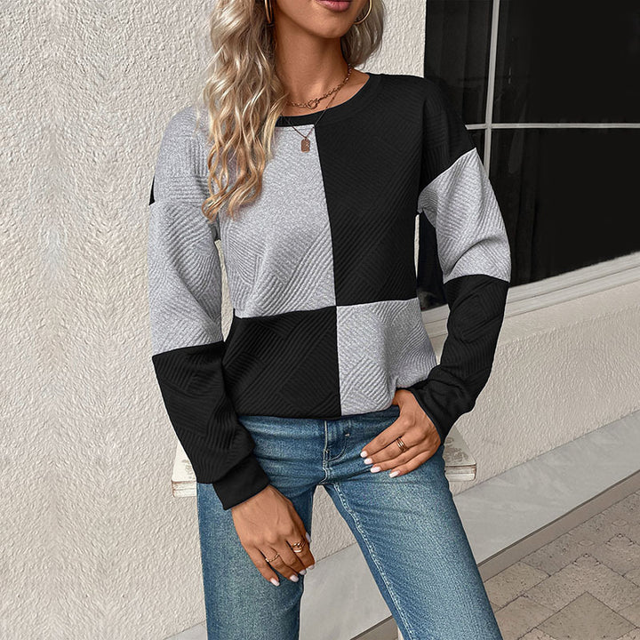Kvinnors modemedvetna sweatshirt med blockrandigt mönster och rund hals Mirla-Eva Jonsson