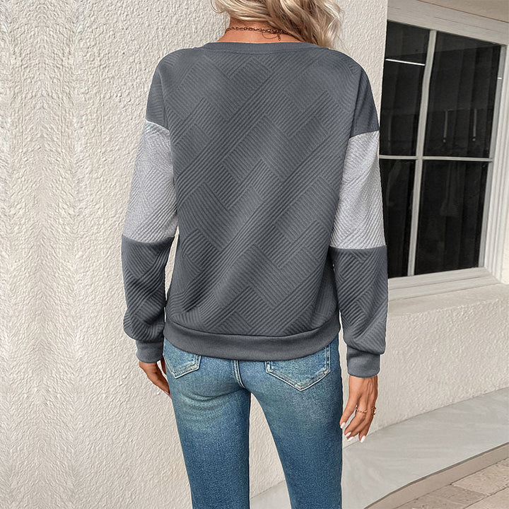 Kvinnors modemedvetna sweatshirt med blockrandigt mönster och rund hals Mirla-Eva Jonsson