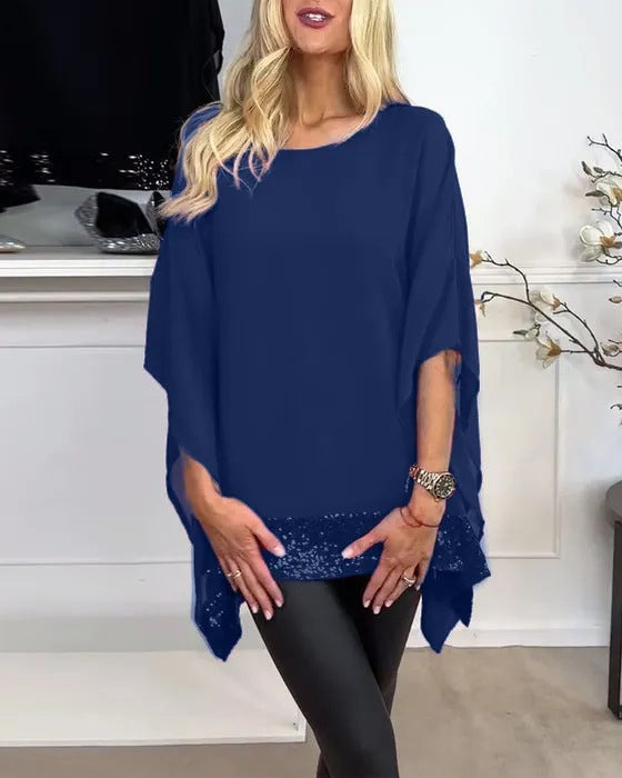 Kvinnors moderiktig poncho-top med elegant spetsavslutning Mirla-Eva Jonsson