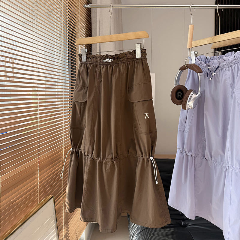 Kvinnors moderiktiga cargokjol med justerbar midja och sidofickor Mirla-Eva Jonsson