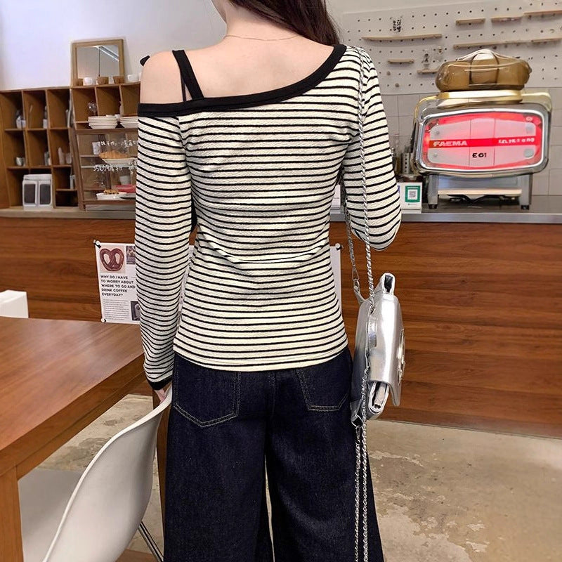 Kvinnors moderiktiga långärmad skjorta med off-shoulder design Mirla-Eva Jonsson
