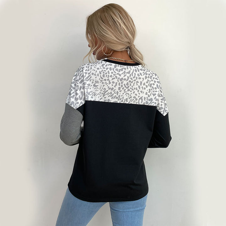 Kvinnors moderiktiga långärmade skjorta med kreativt leopardtryck och blockränder Mirla-Eva Jonsson