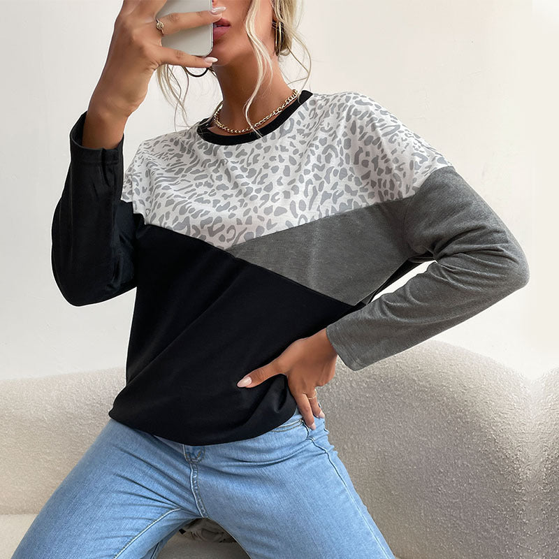 Kvinnors moderiktiga långärmade skjorta med kreativt leopardtryck och blockränder Mirla-Eva Jonsson