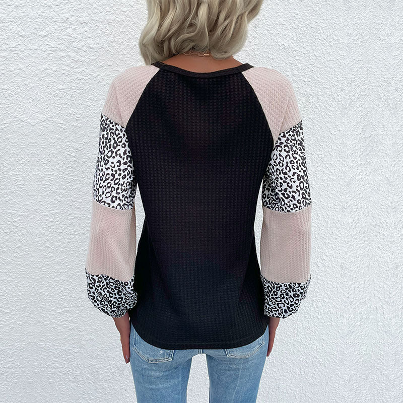 Kvinnors moderna topp med djurmönster och eleganta puffärmar Mirla-Eva Jonsson