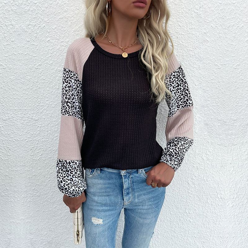 Kvinnors moderna topp med djurmönster och eleganta puffärmar Mirla-Eva Jonsson