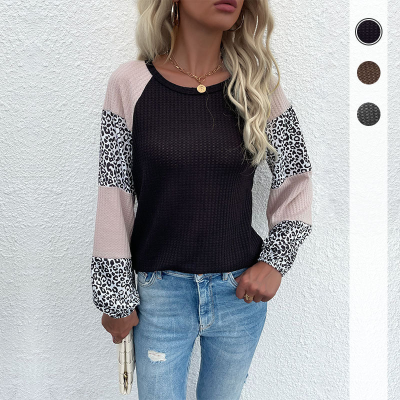Kvinnors moderna topp med djurmönster och eleganta puffärmar Mirla-Eva Jonsson