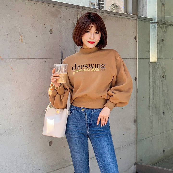 Kvinnors modiga sweatshirt med voluminösa ärmar Mirla-Eva Jonsson