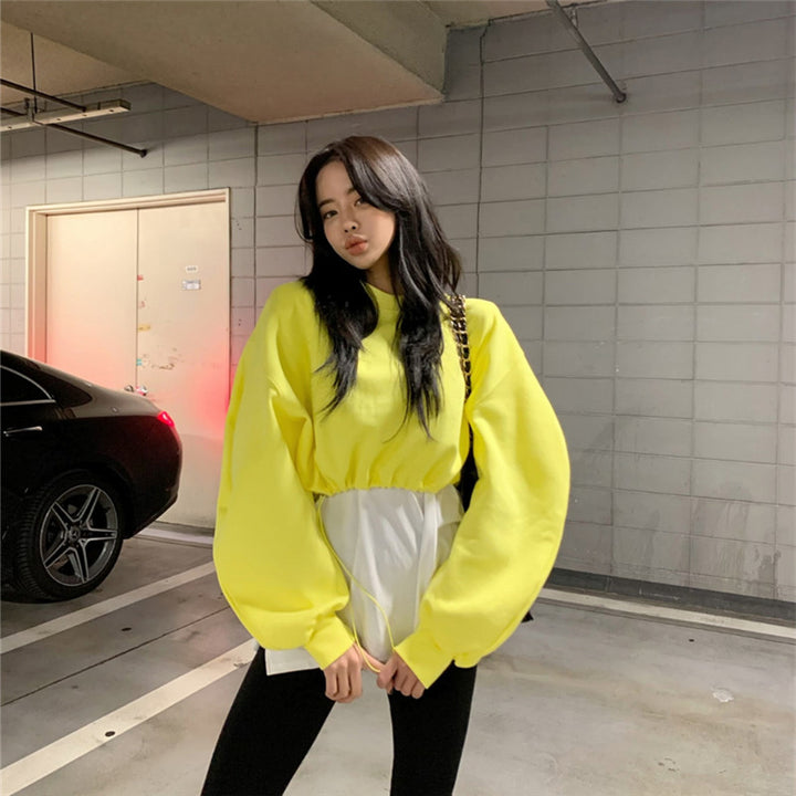 Kvinnors modiga sweatshirt med voluminösa ärmar Mirla-Eva Jonsson