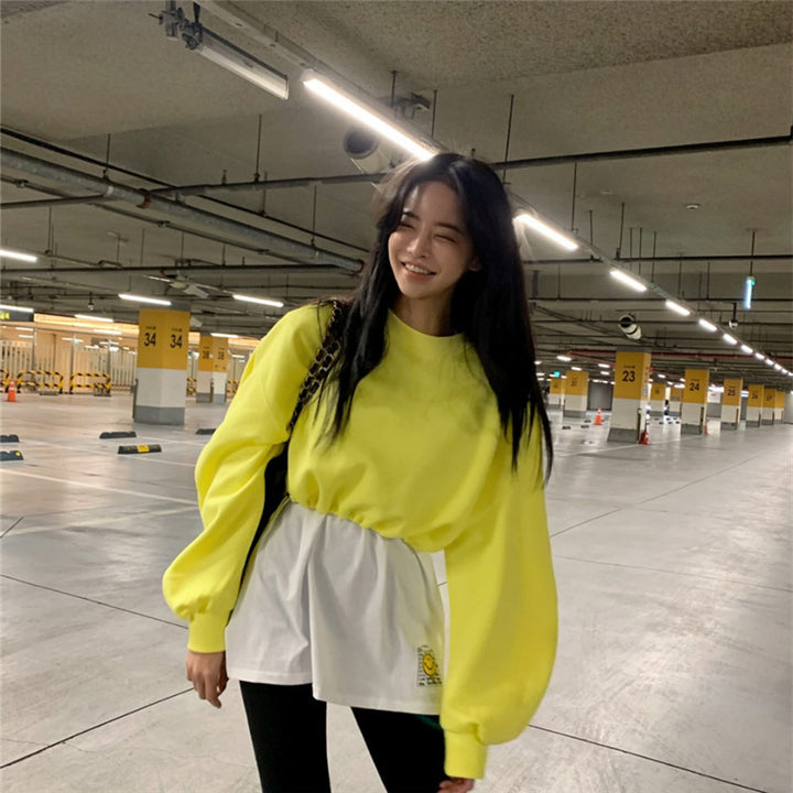Kvinnors modiga sweatshirt med voluminösa ärmar Mirla-Eva Jonsson