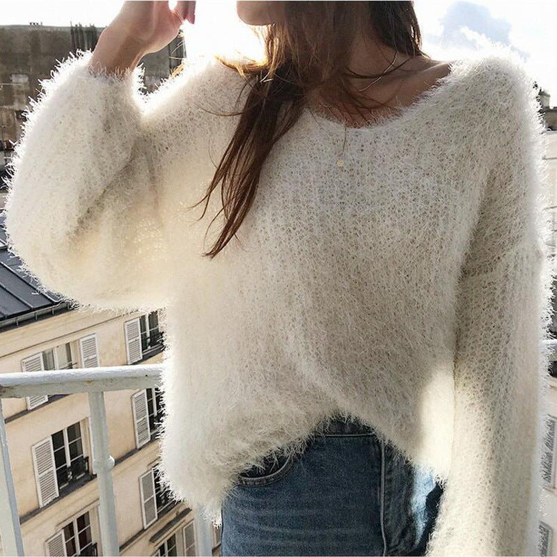 Kvinnors mysiga V-hals tröja med mjuk fluffig textur Mirla-Eva Jonsson