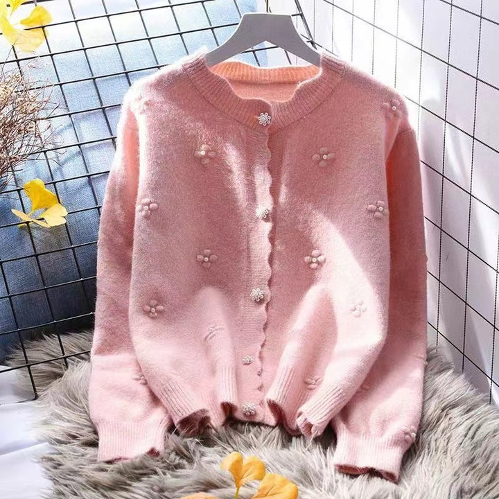 Kvinnors mysiga cardigan med blommönsterapplikationer Mirla-Eva Jonsson