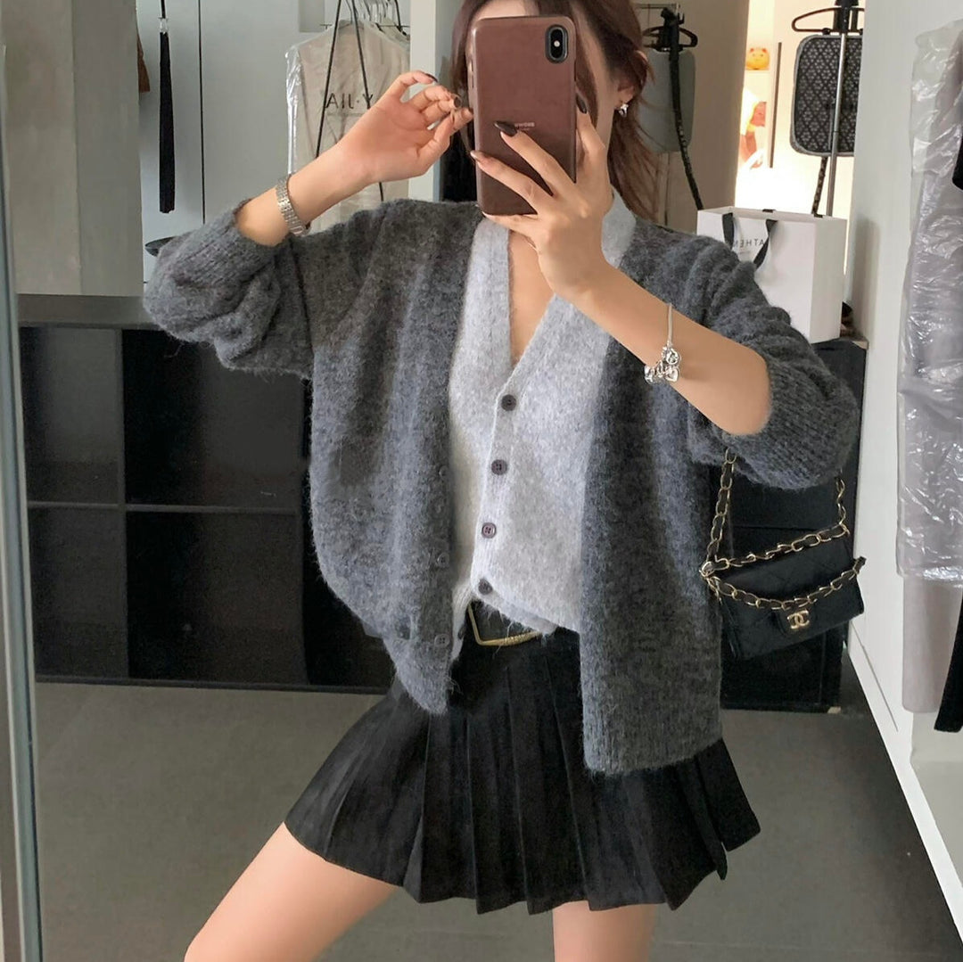 Kvinnors mysiga cardigan med lekfull V-hals och mjukt material Mirla-Eva Jonsson