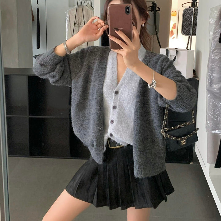 Kvinnors mysiga cardigan med lekfull V-hals och mjukt material Mirla-Eva Jonsson