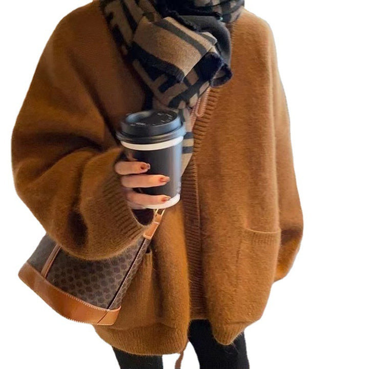 Kvinnors mysiga cardigan med öppna frontpartier och praktiska fickor Mirla-Eva Jonsson
