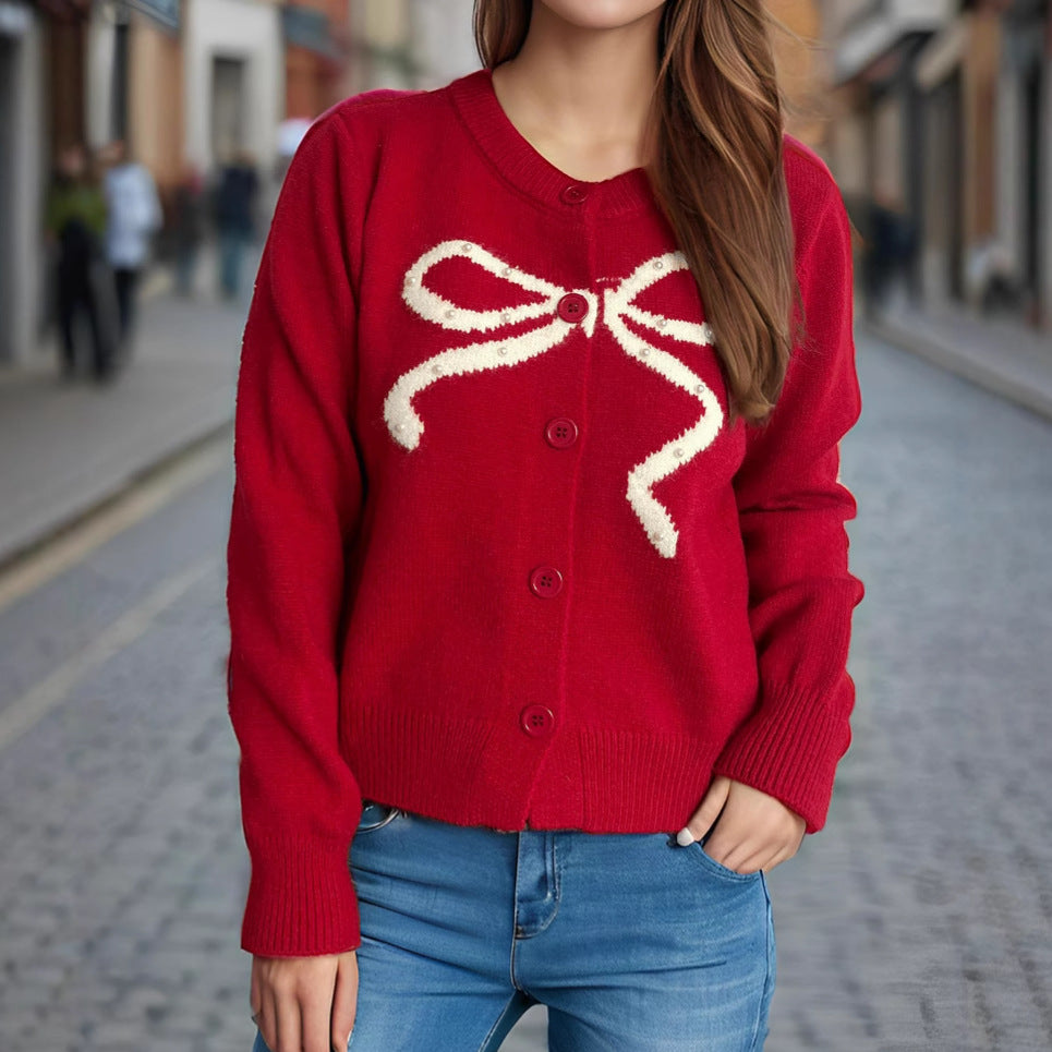 Kvinnors mysiga cardigan med rosettmotiv Mirla-Eva Jonsson