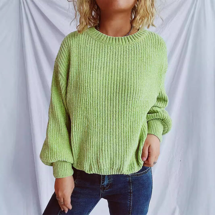 Kvinnors mysiga chunky stickad tröja med vida ärmar och texturerad design Mirla-Eva Jonsson