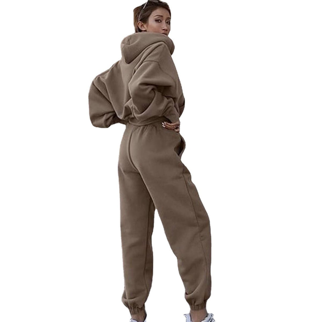 Kvinnors mysiga fleece jumpsuit med oversized huva och elastiskt midjeband Mirla-Eva Jonsson