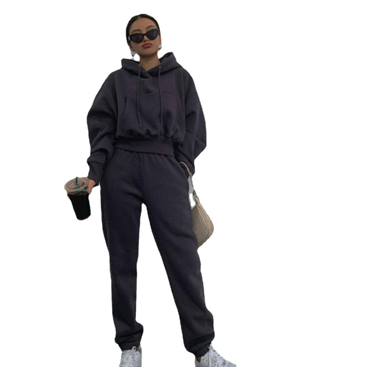 Kvinnors mysiga fleece jumpsuit med oversized huva och elastiskt midjeband Mirla-Eva Jonsson