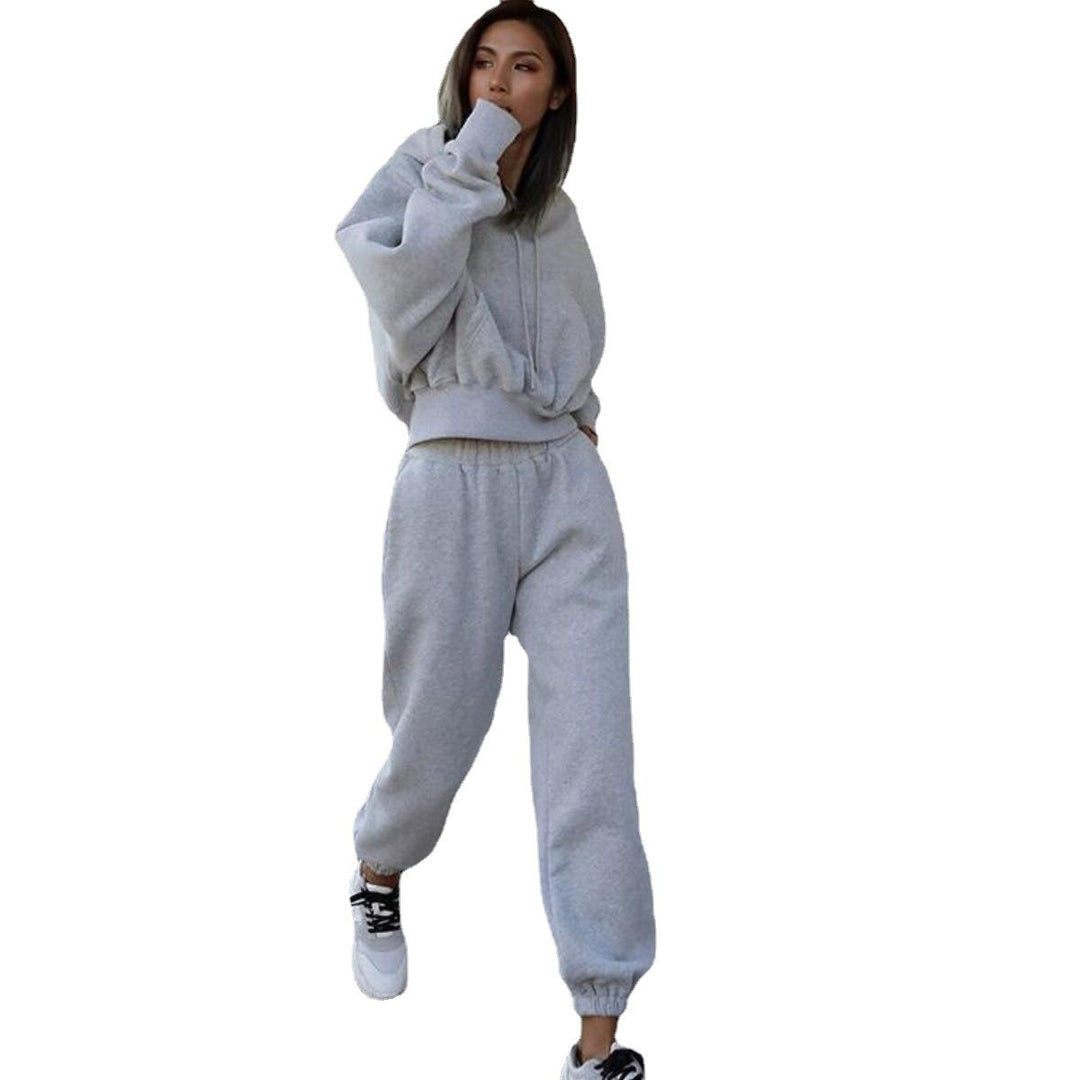 Kvinnors mysiga fleece jumpsuit med oversized huva och elastiskt midjeband Mirla-Eva Jonsson