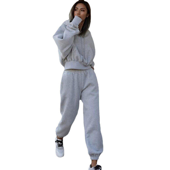 Kvinnors mysiga fleece jumpsuit med oversized huva och elastiskt midjeband Mirla-Eva Jonsson
