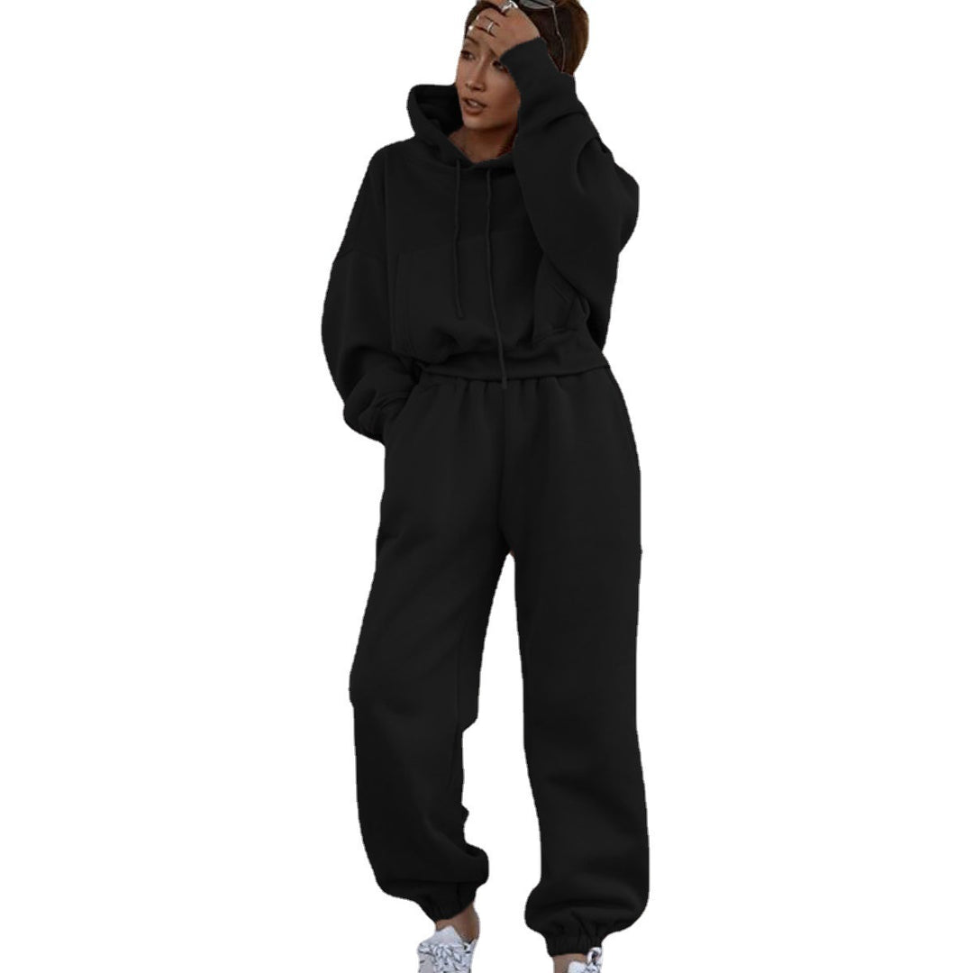 Kvinnors mysiga fleece jumpsuit med oversized huva och elastiskt midjeband Mirla-Eva Jonsson