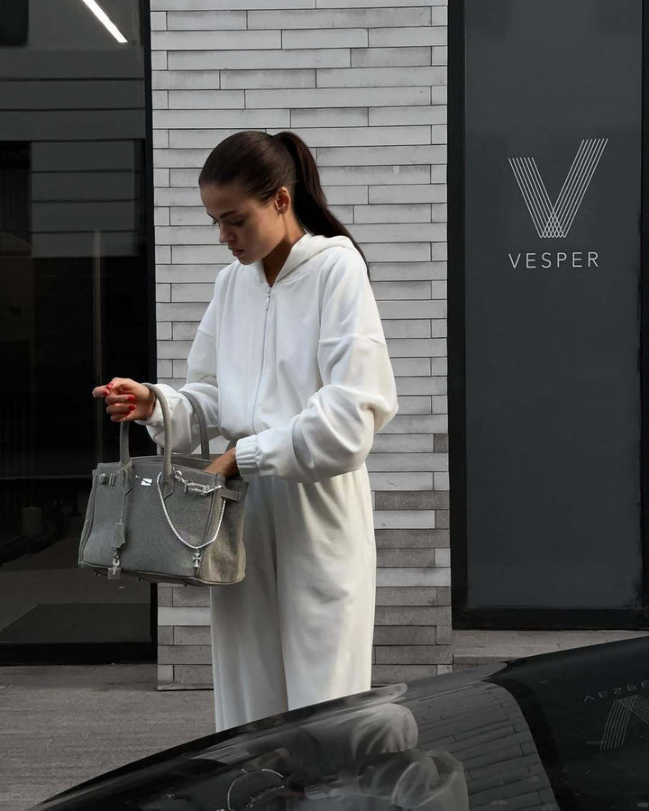 Kvinnors mysiga fleece overall med huva och praktiska fickor Mirla-Eva Jonsson