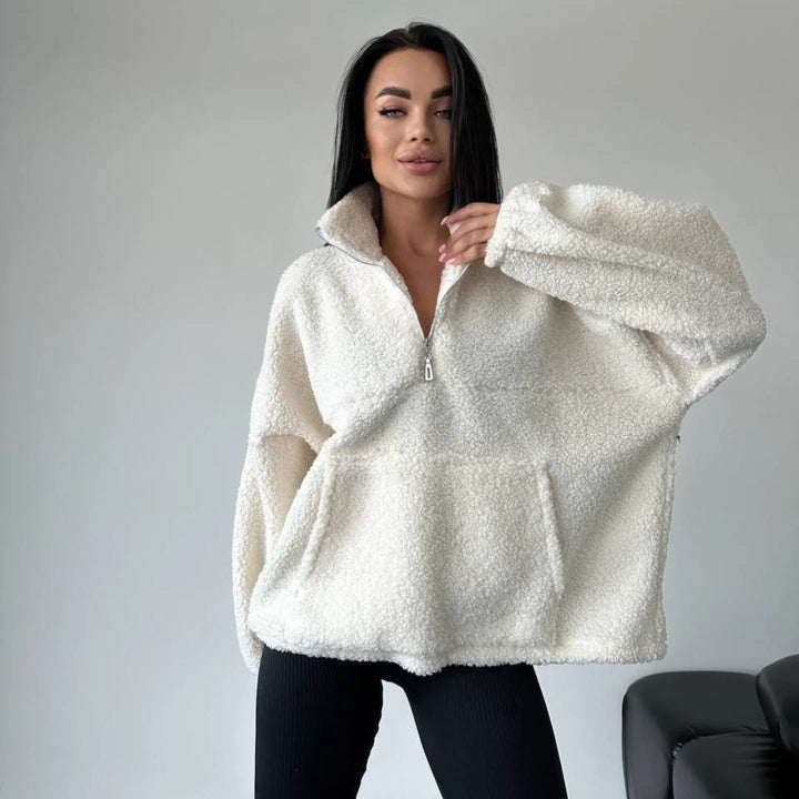 Kvinnors mysiga fleece-tröja med halv dragkedja och elastiska ärmar Mirla-Eva Jonsson