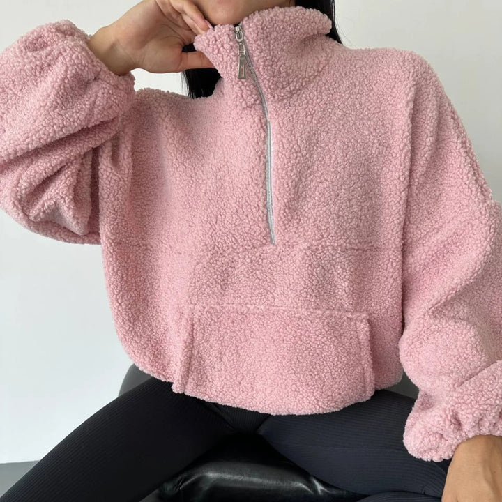 Kvinnors mysiga fleece-tröja med halv dragkedja och elastiska ärmar Mirla-Eva Jonsson