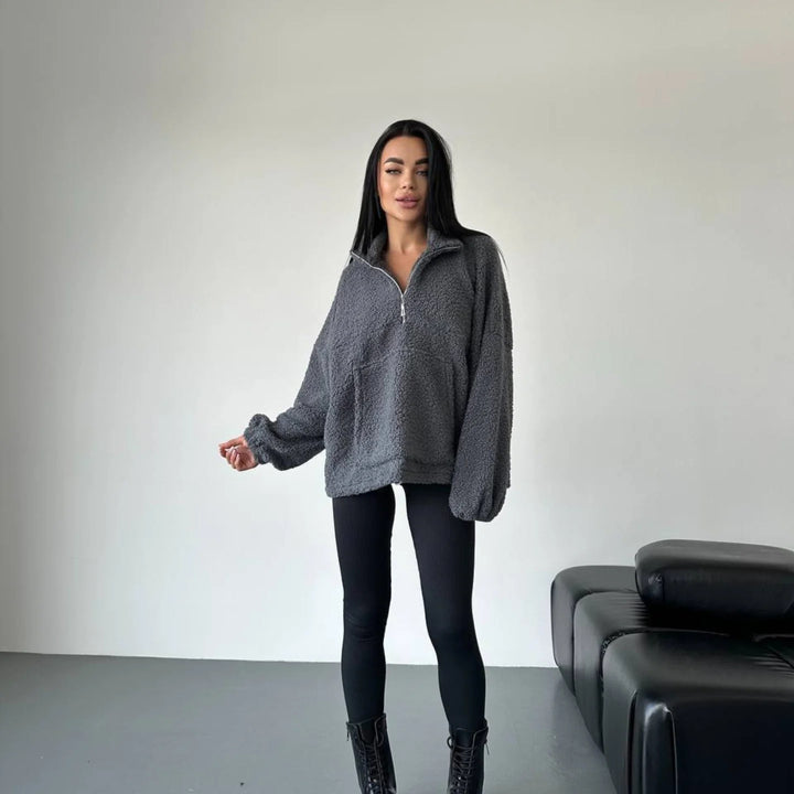 Kvinnors mysiga fleece-tröja med halv dragkedja och elastiska ärmar Mirla-Eva Jonsson