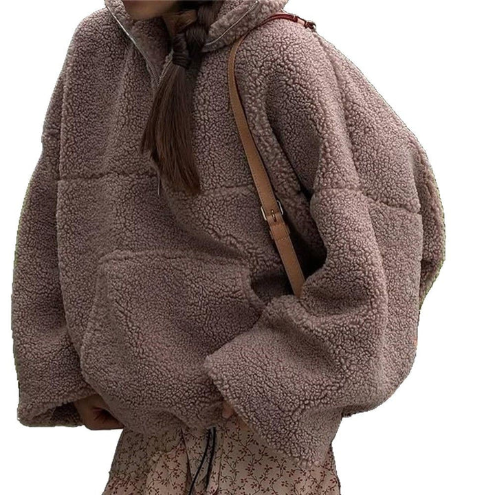 Kvinnors mysiga fleece-tröja med halv dragkedja och elastiska ärmar Mirla-Eva Jonsson
