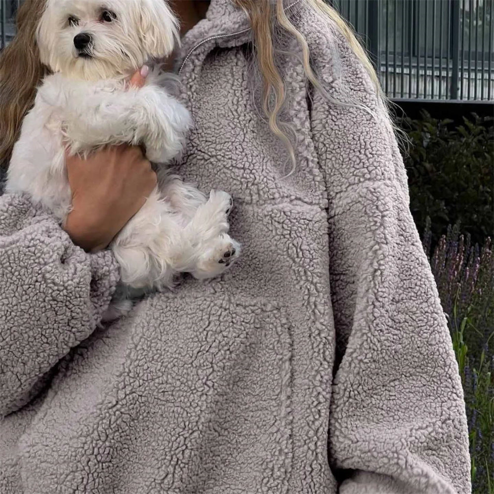 Kvinnors mysiga fleece-tröja med halv dragkedja och elastiska ärmar Mirla-Eva Jonsson